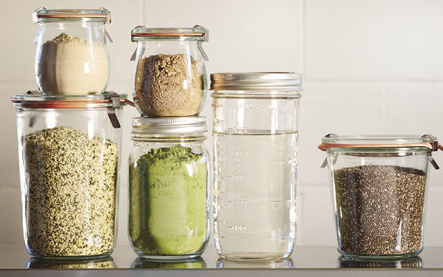 Jars filled with seeds, powders, and liquid