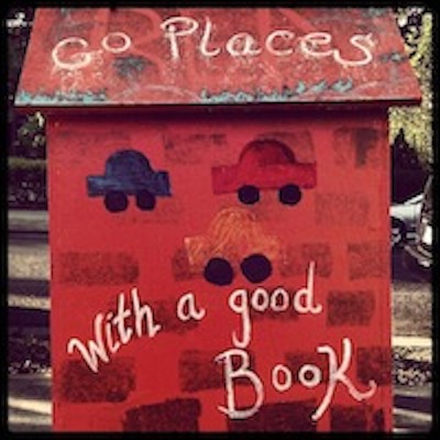 A red Little Free Library