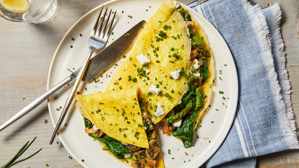 a plate with a veggie omelet