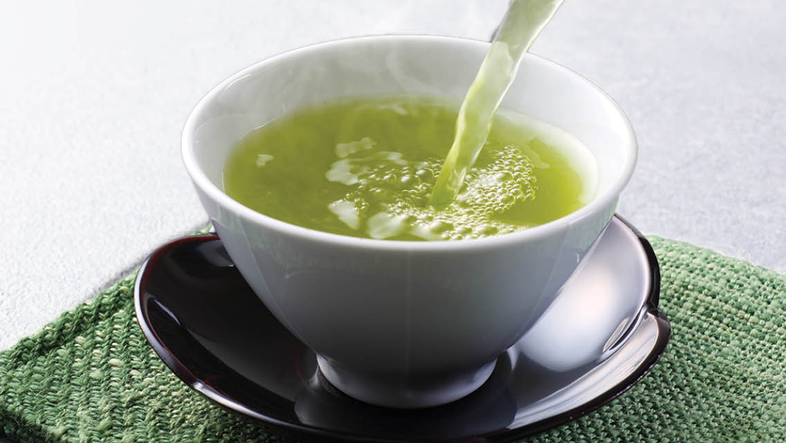 a cup of hot green tea