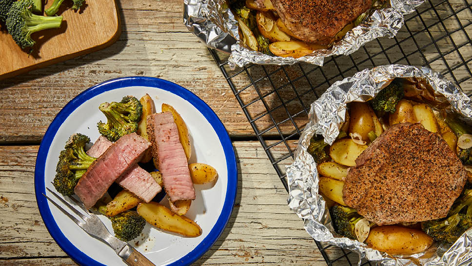 steak and potatoes cooked in a foil pack