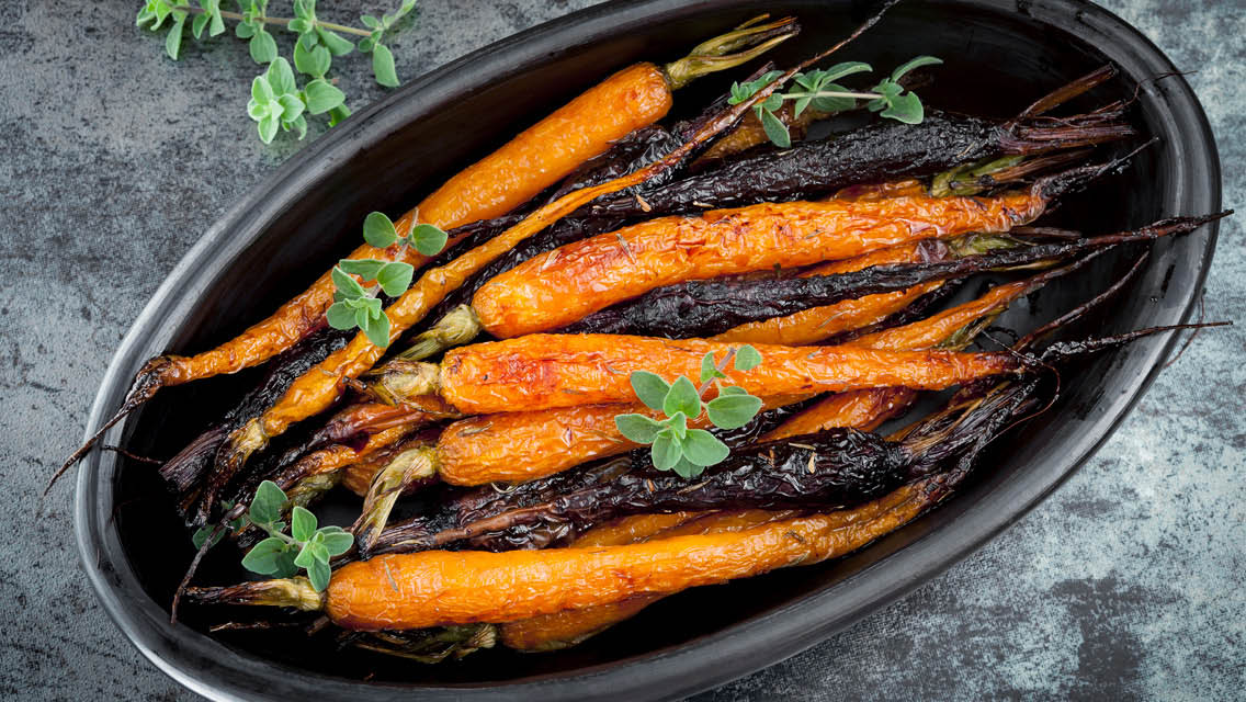 a dish of curry glazed carrots