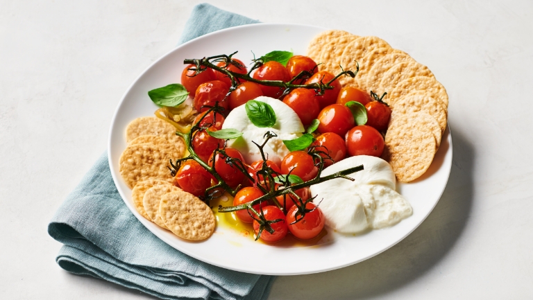 cherry tomatoes with burrata and rice crackers