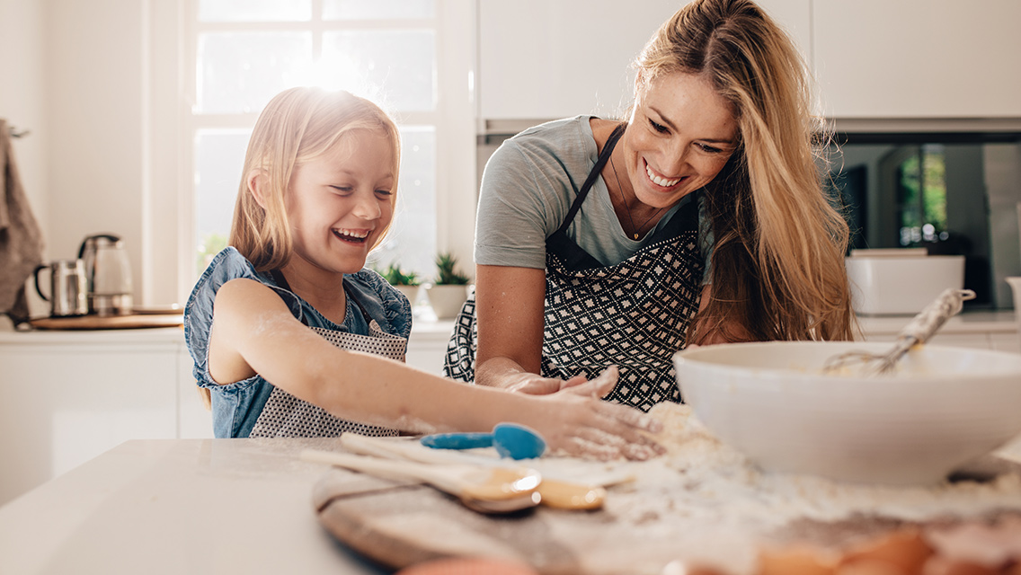 a mom and daughter bake together