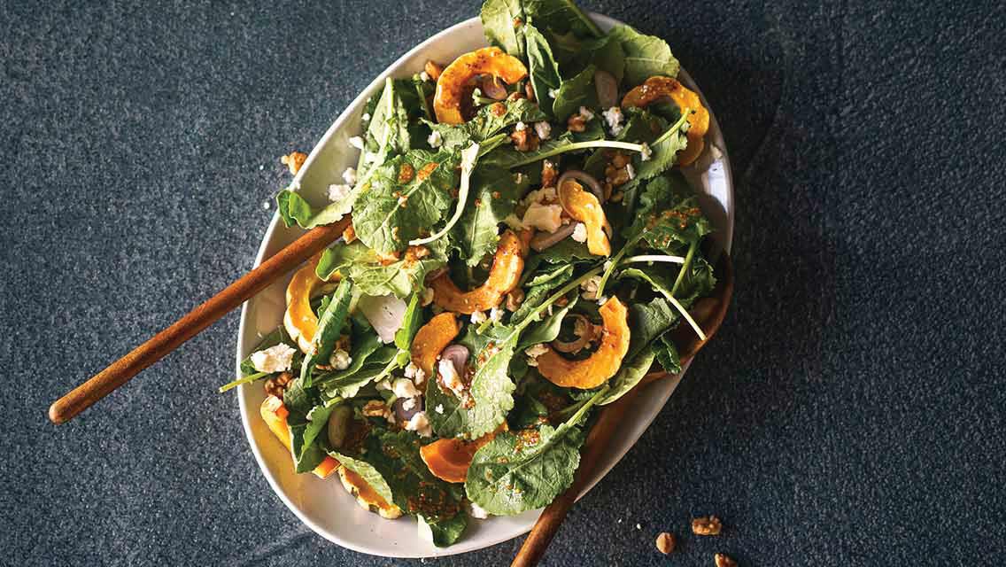 a salad with squash slices