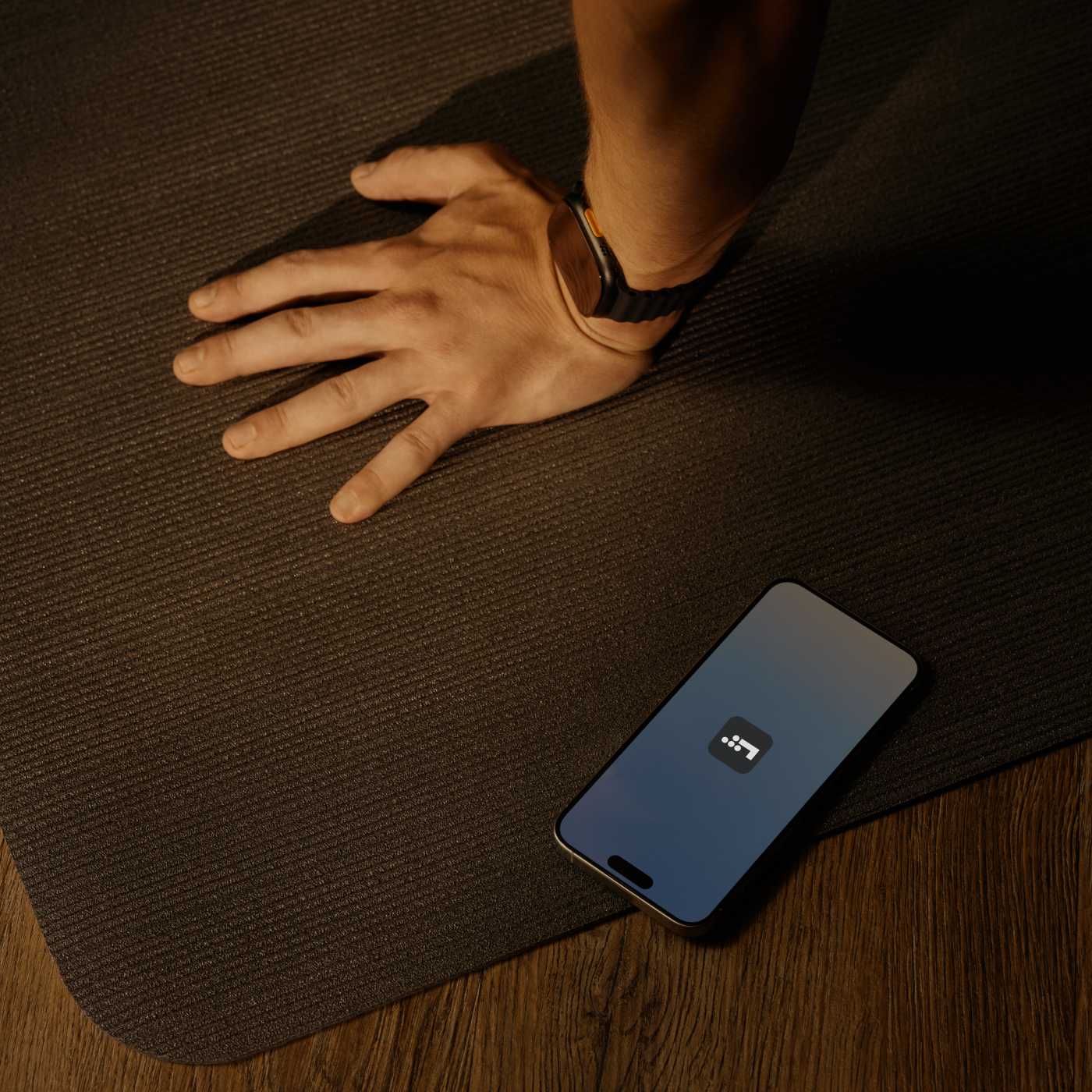 phone with LT app on workout mat