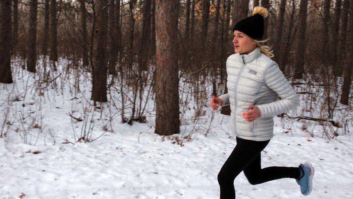 Callie Fredrickson on a run outside in winter weather.