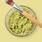 mashed avocado with a makeup brush
