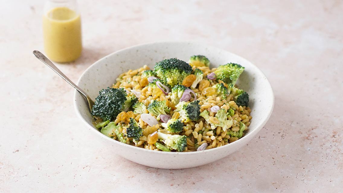 a grain bowl with broccoli