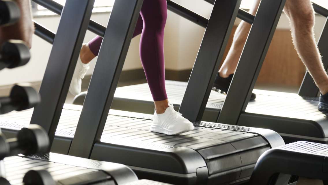 woman's feet on treadmill