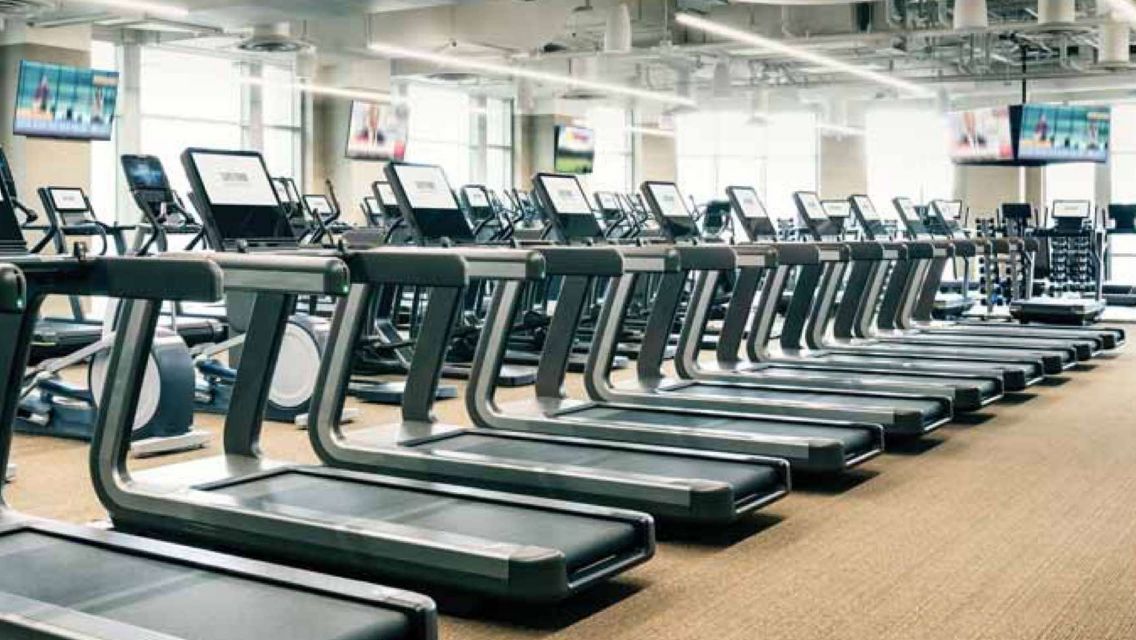 A line of treadmills at dumbo
