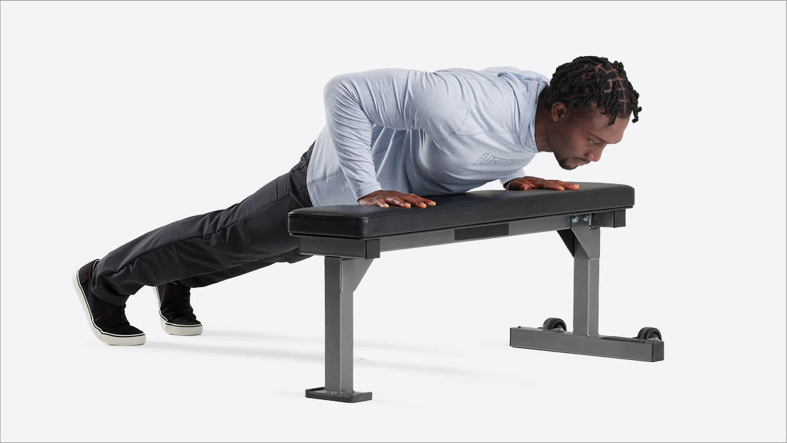 a man does an elevated push up