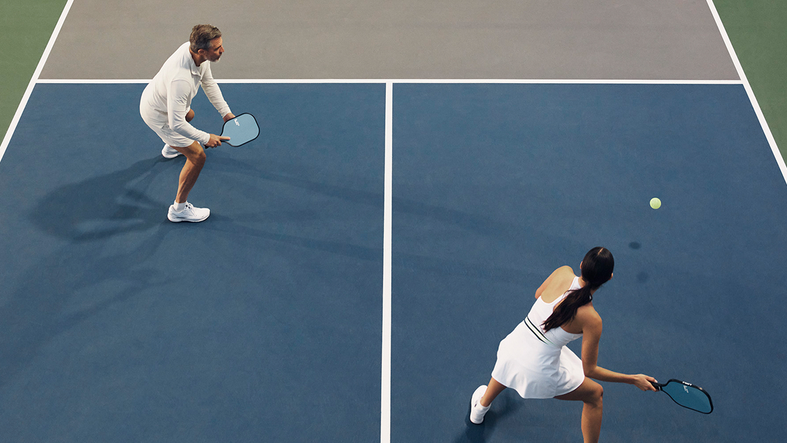 Two players on pickleball court