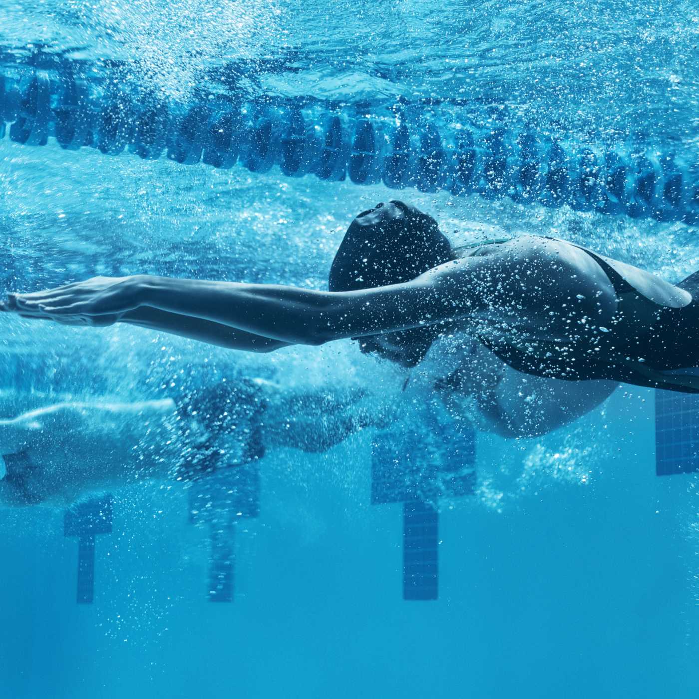 person swimming underwater