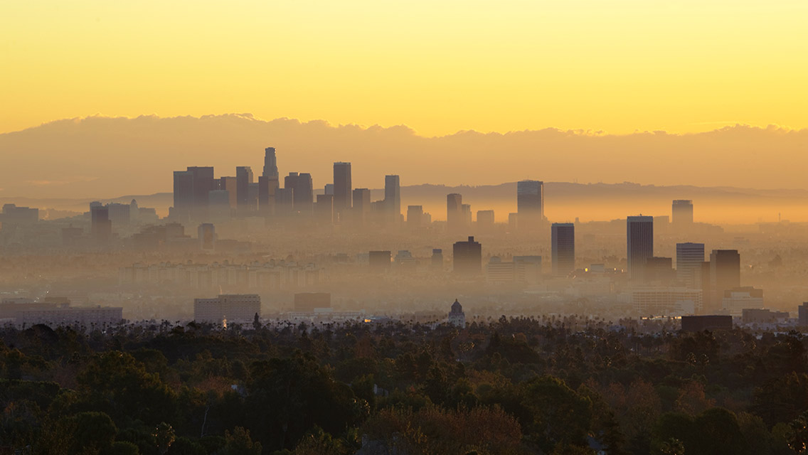 a city sky line with smog
