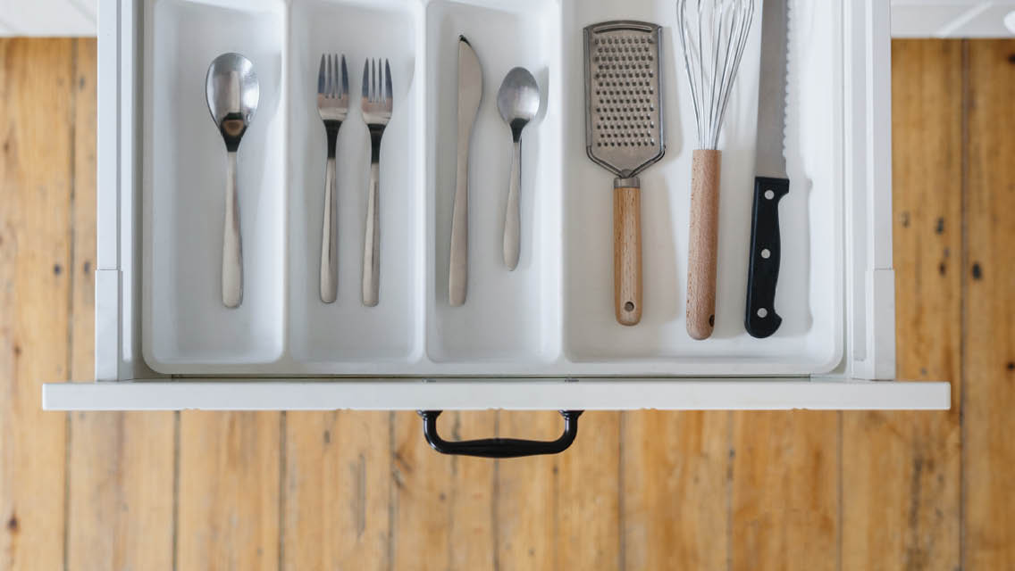 a decluttered utensil drawer
