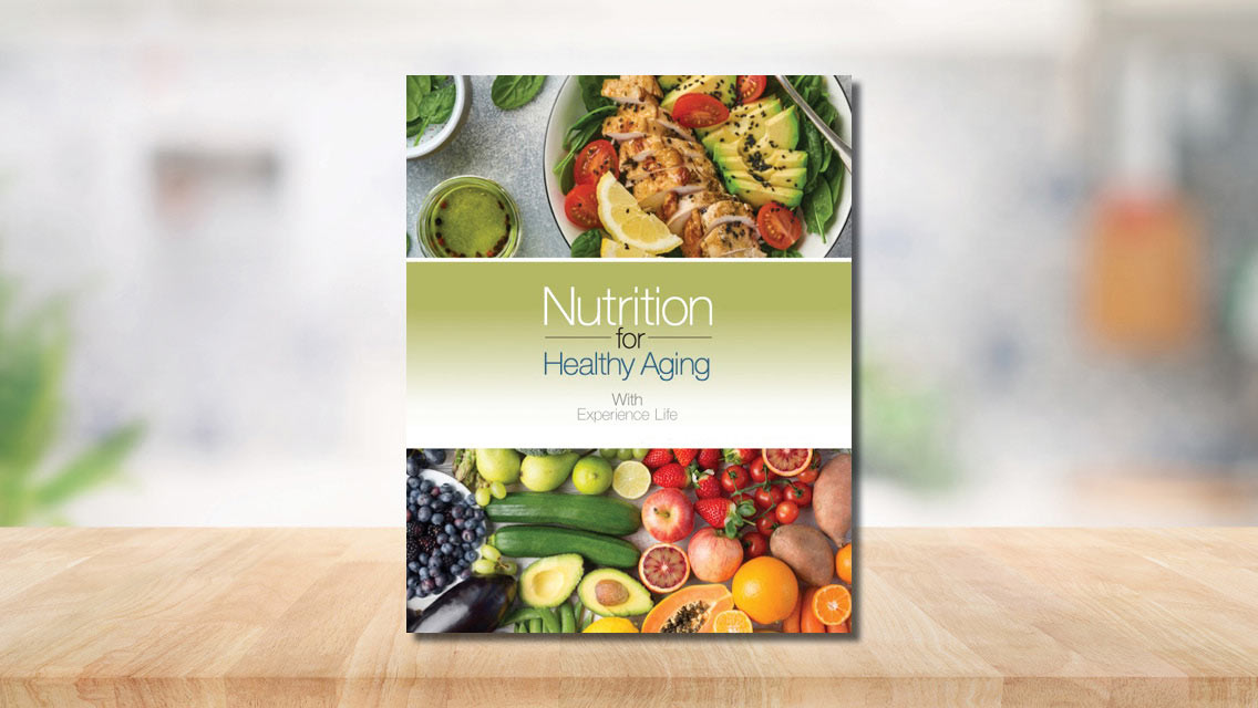 Cover of Nutrition for Healthy Aging e-book on wood table.