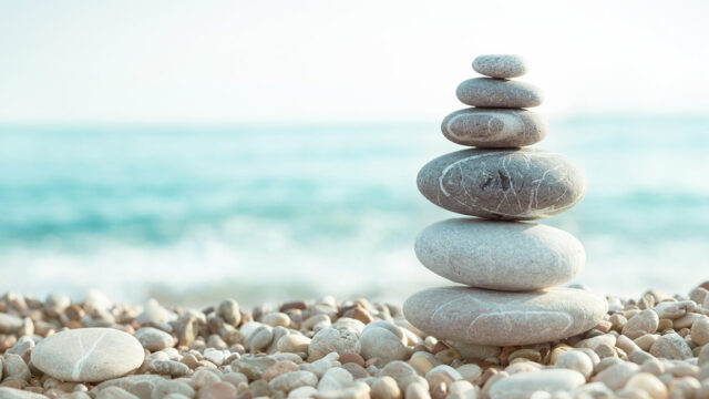 Balancing rocks on beach