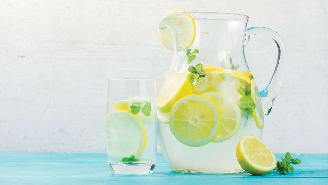 a pitcher of lemon and mint water