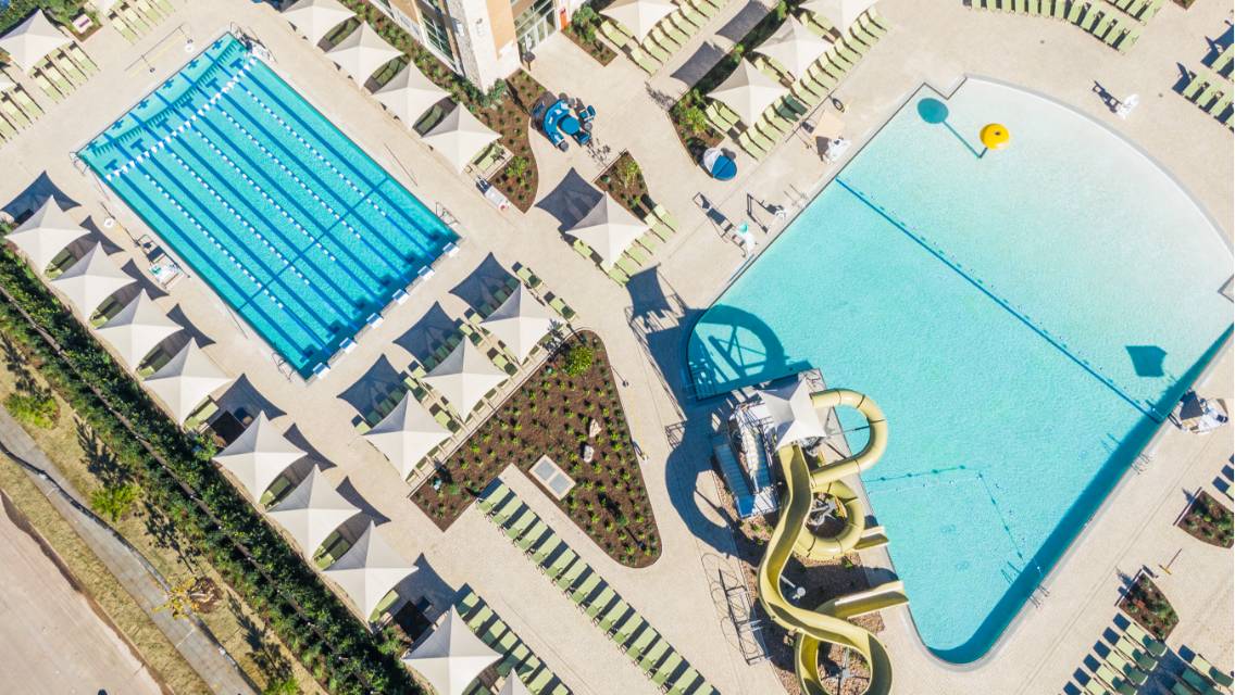 Aerial view of the Beach Club outoor pools at Life Time