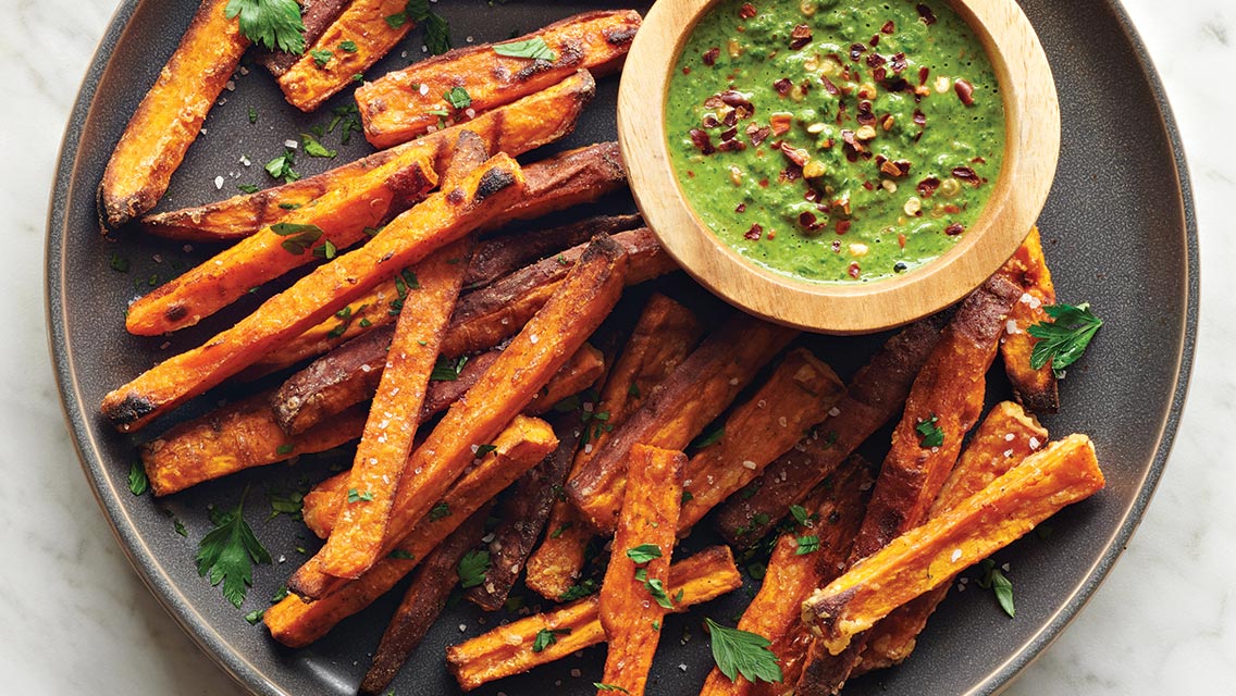 sweet potato fries with bowl of chimichurri