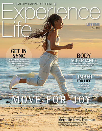 June 2023 cover of Experience Life with Mechelle Lewis Freeman running on beach