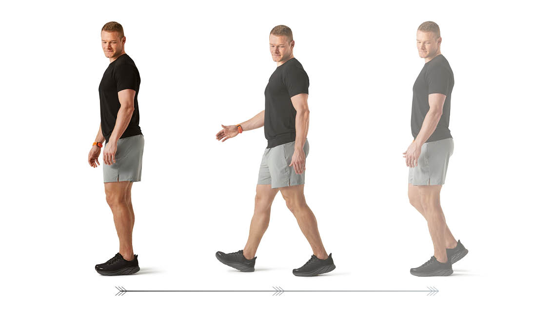 a man walking backwards