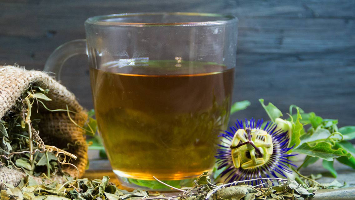 a cup of herbal tea with passionflower