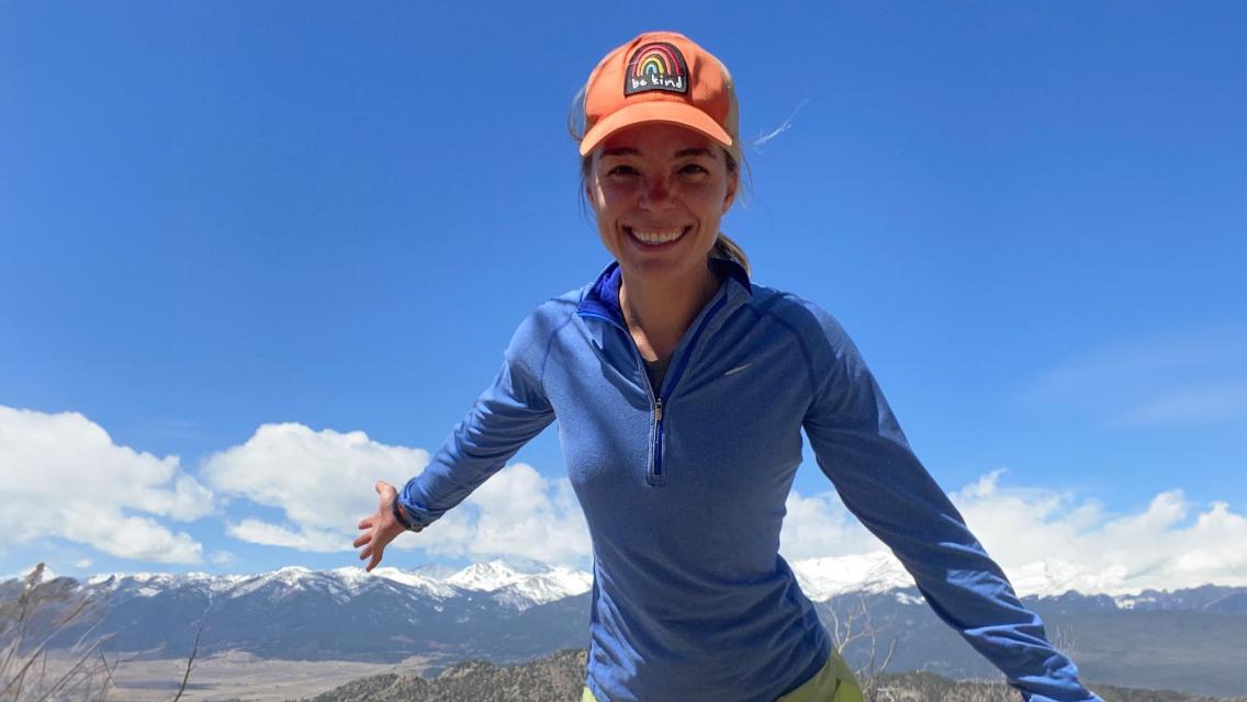 Barbara Powell smiling while on a run outside in Colorado.
