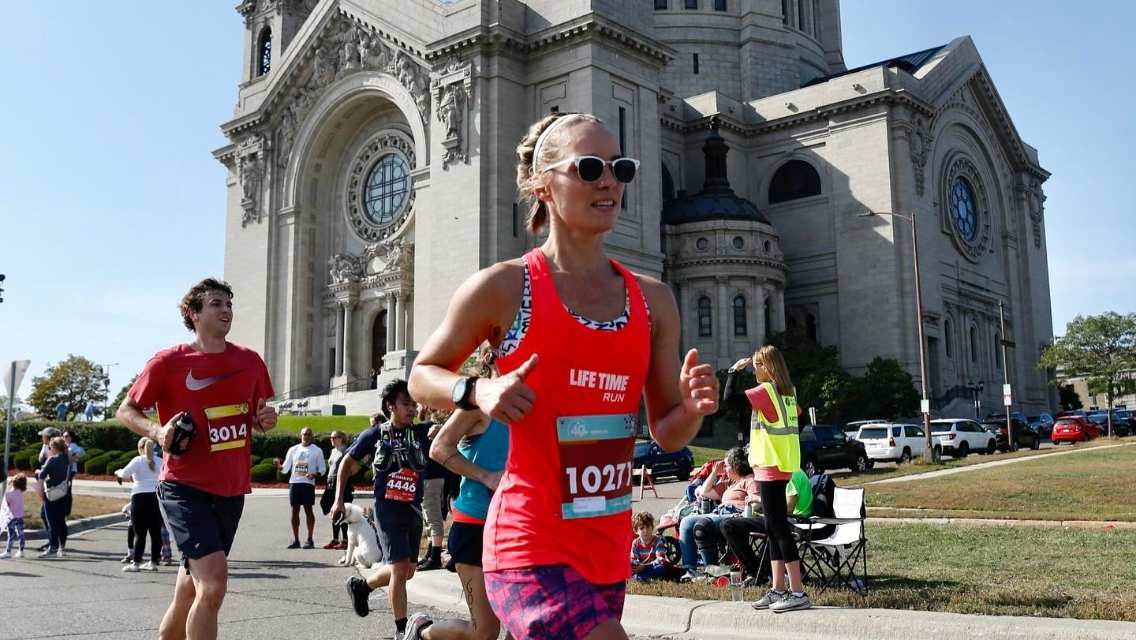 Barbara Powell running the Twin Cities Marathon.