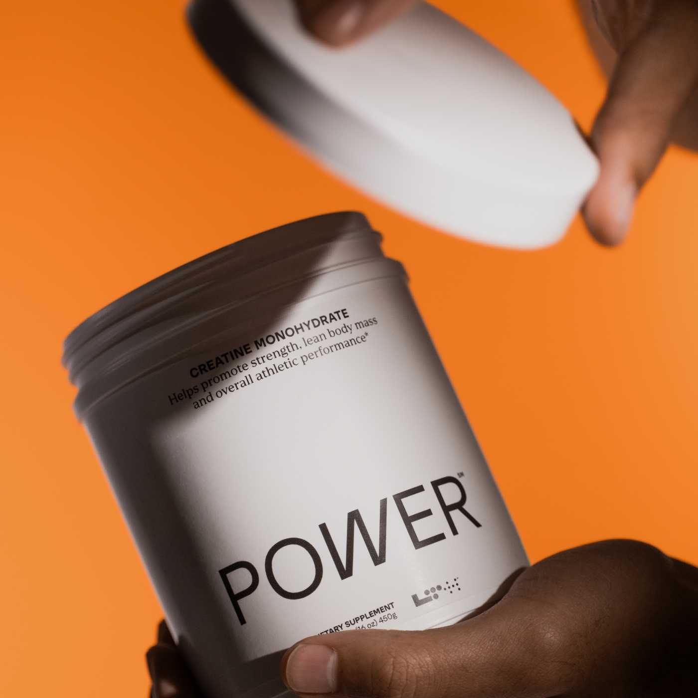 person holding tub of power