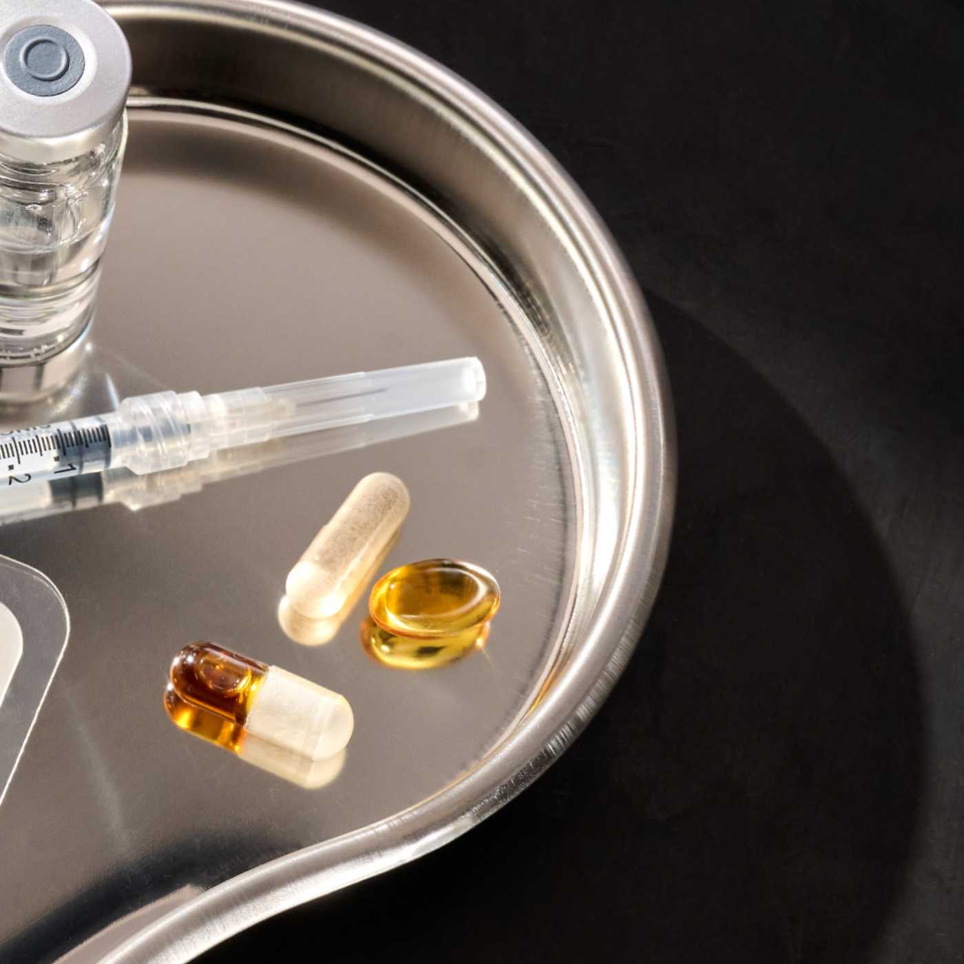 tray with needle and capsules