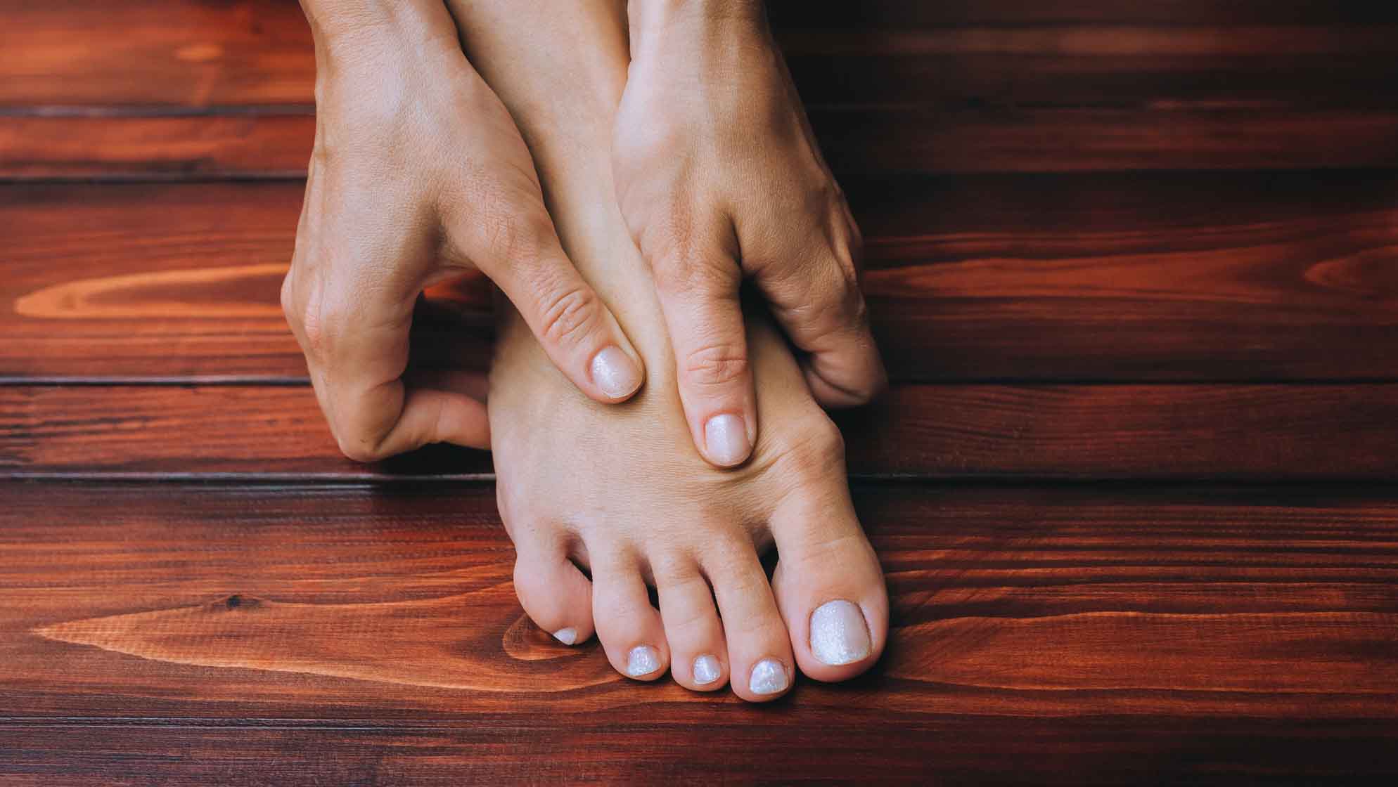 hands on a foot