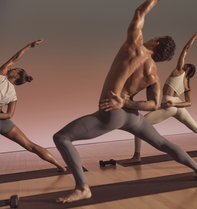 Individuals in a yoga fitness class.