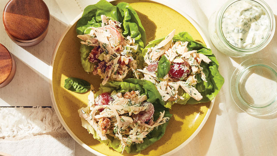 mayo free herby chicken salad served in lettuce wraps
