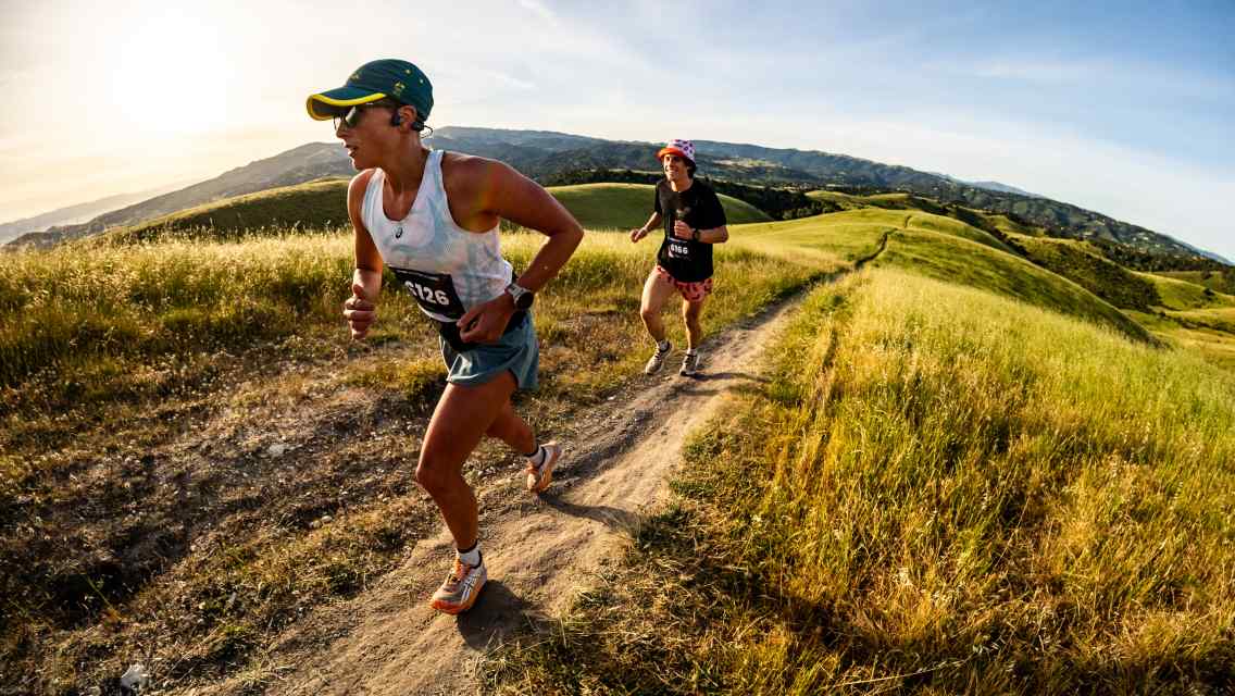 People trail running.