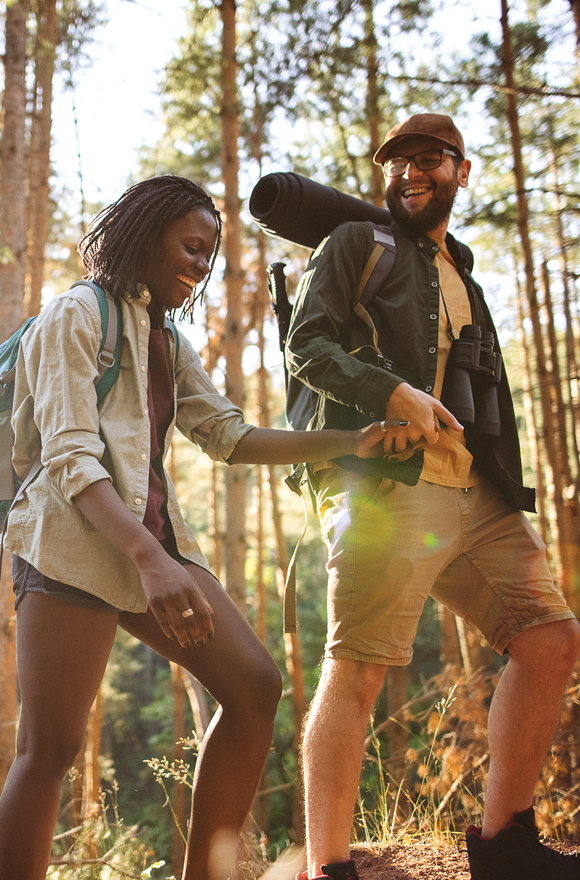 a couple hiking in the woods