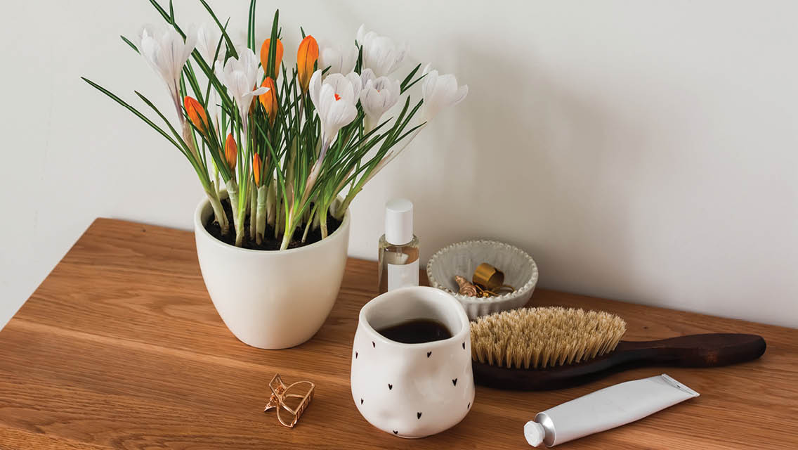 an end table with spring items