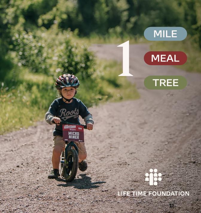 A little boy on a bike with the text "1 mile, meal, tree" on the image.