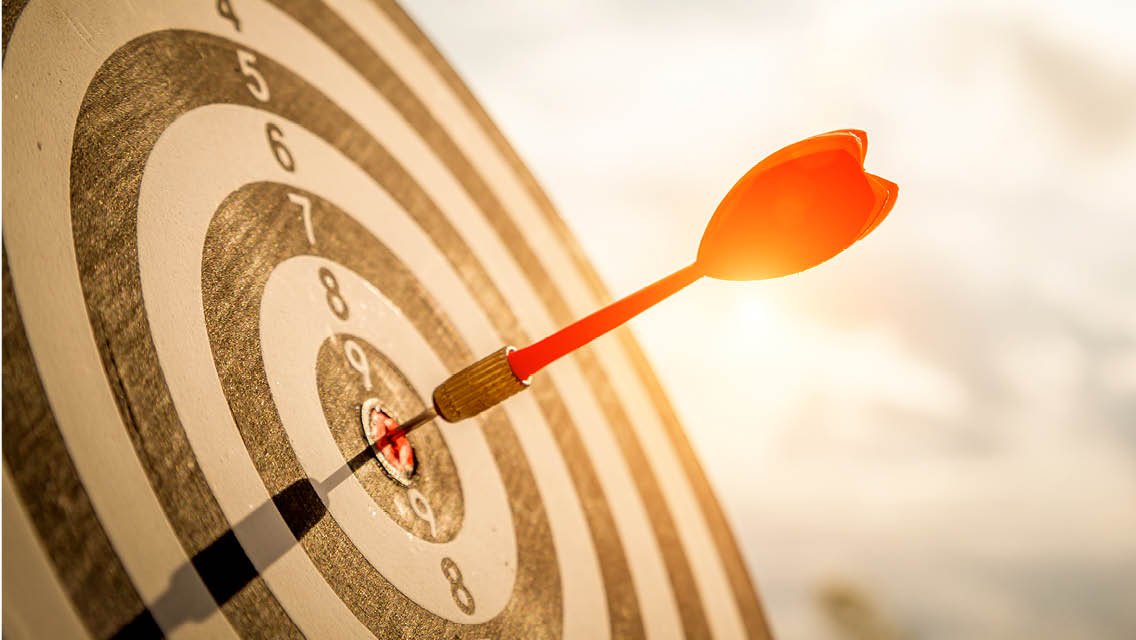 an arrow in a bullseye