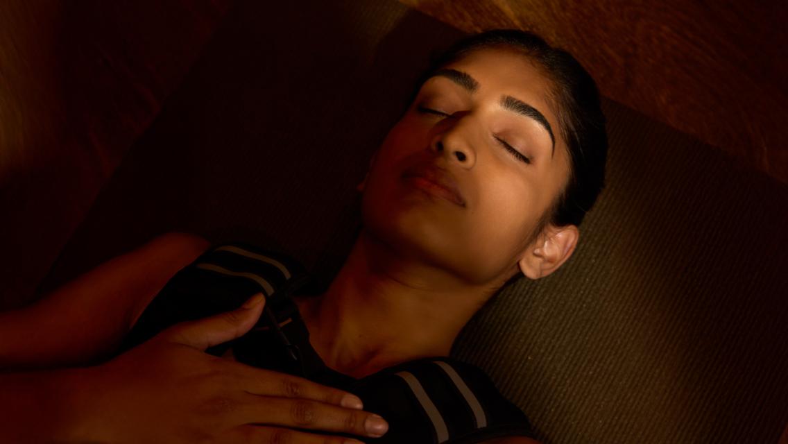 woman with eyes closed