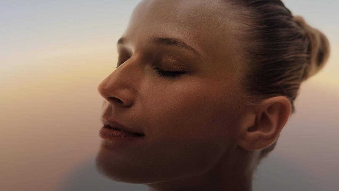 woman with eyes closed