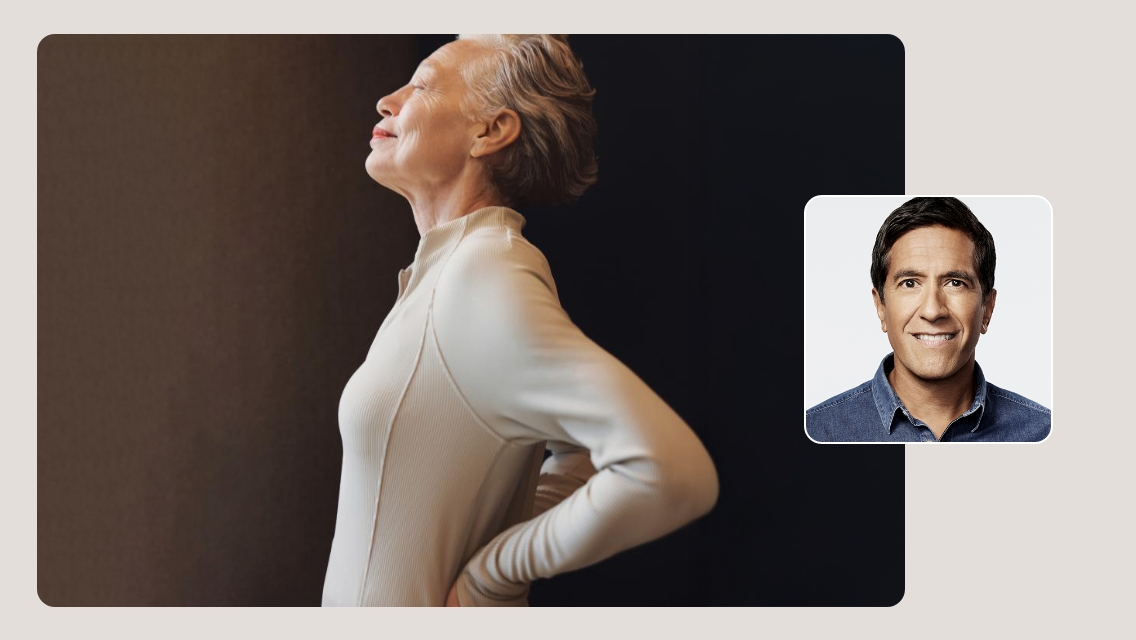 woman holding her back