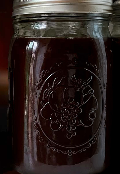jar of pomegranate shrub