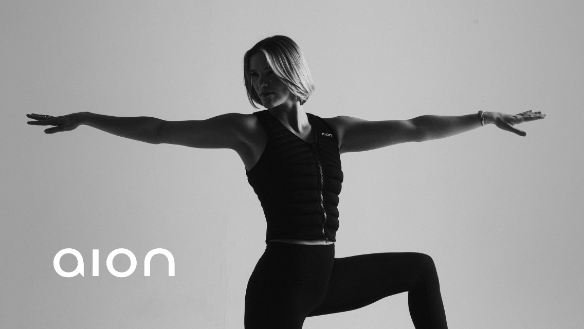 a woman wearing an Aion weighted vest
