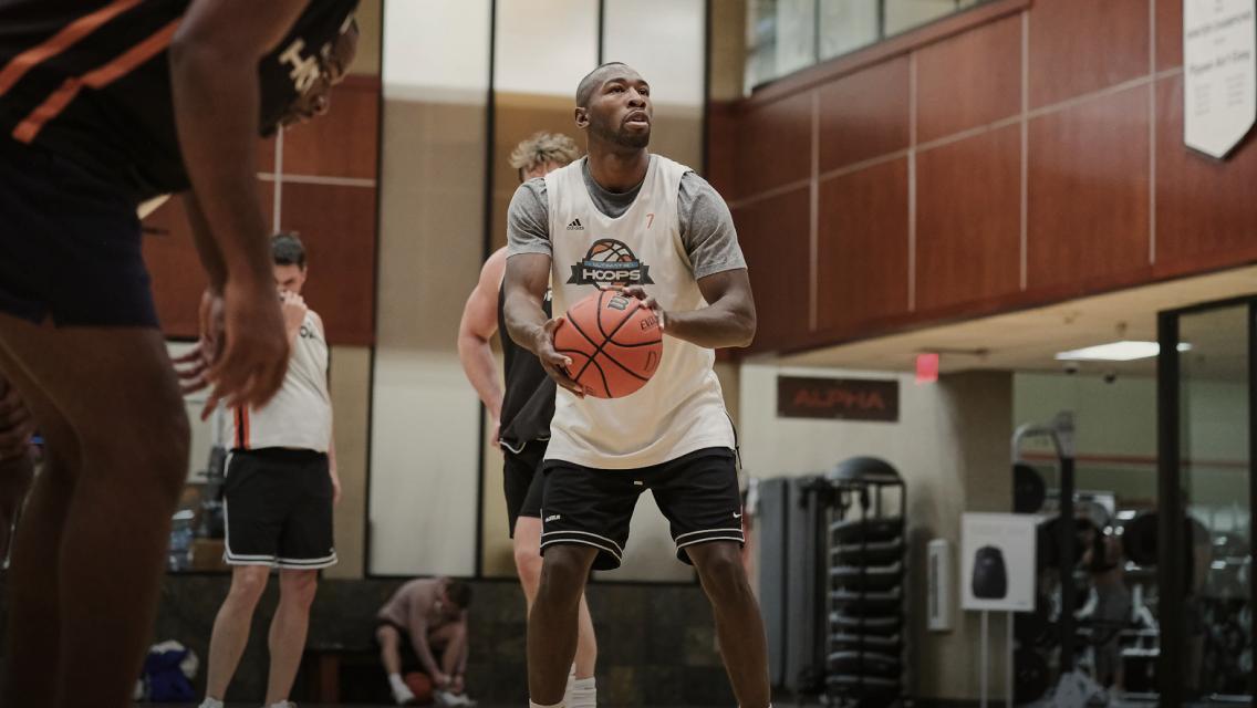 man holding a basketball