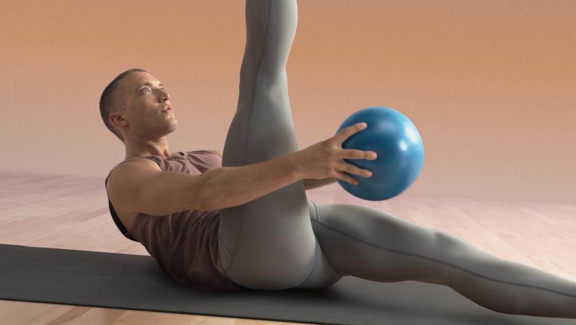 person doing a move with a pilates ball