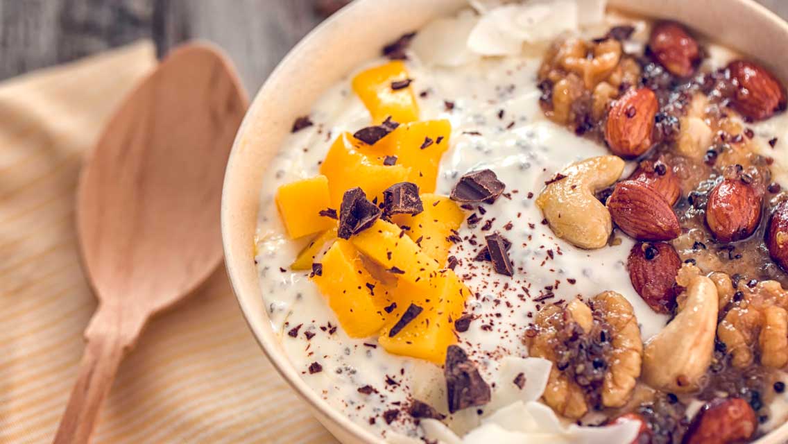 a bowl of health fruit and nuts