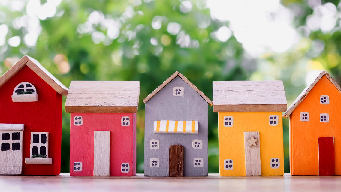 a row of colorful decorative house