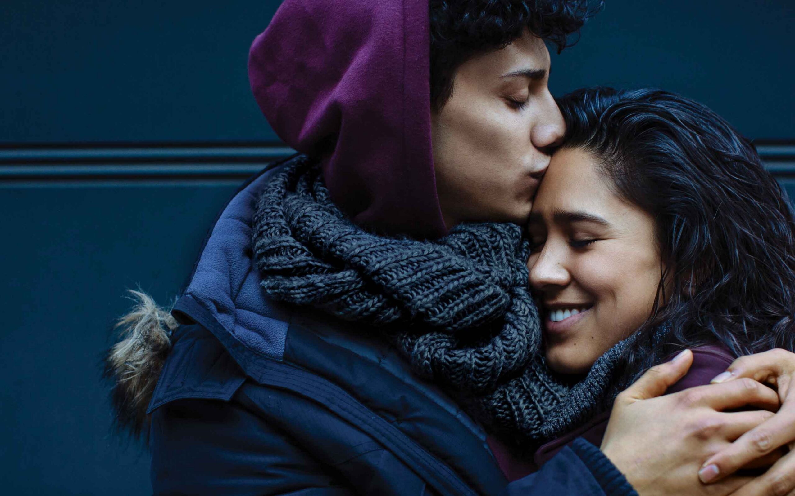 a couple embraces